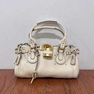 Chic Cream Satchel with Gold Accents